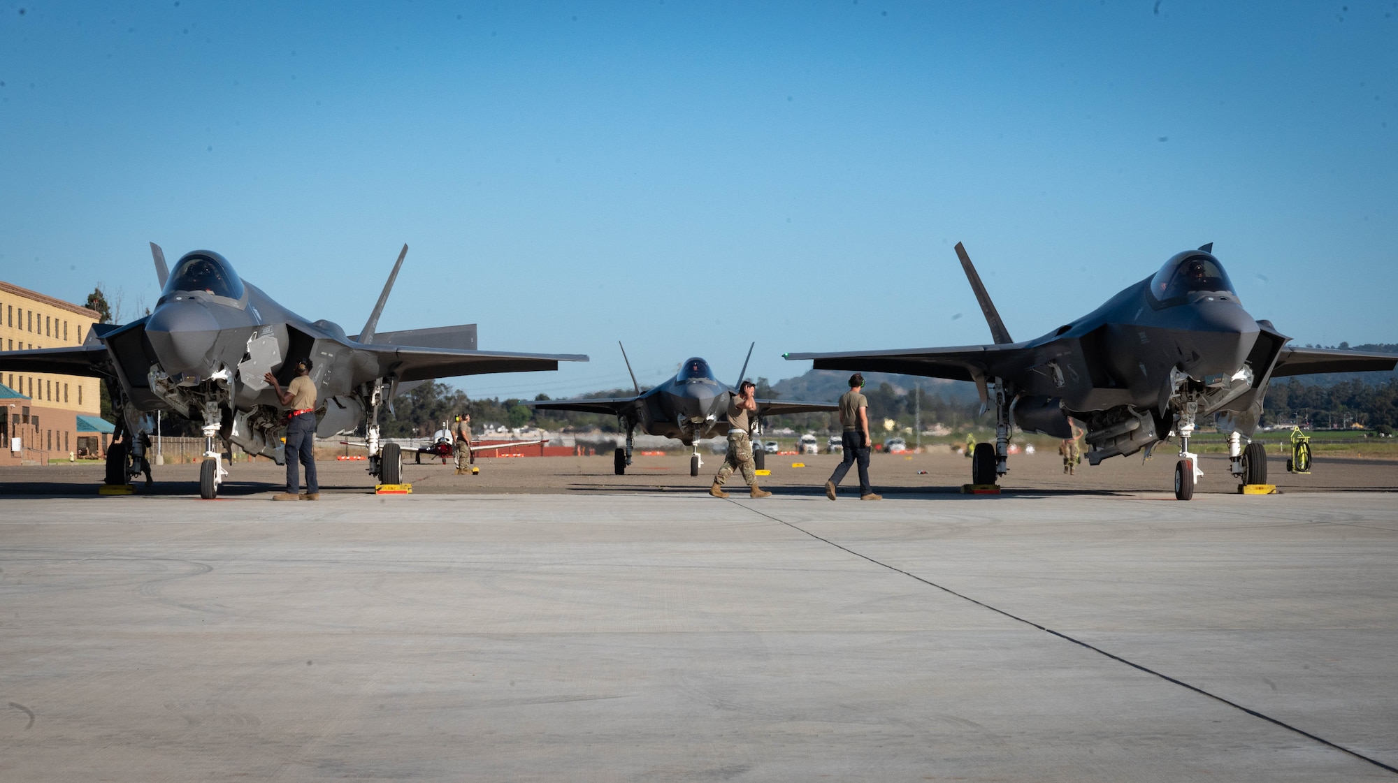 A photo of maintainers with the F-35