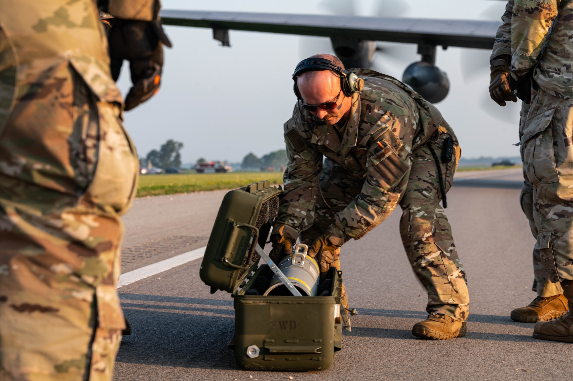A U.S. Air Force Airman assigned to the 1st Special Operations Wing, inspects ammunition during Emerald Warrior 24 FTX II highway landing operation in Bono, Arkansas, August 4, 2024.