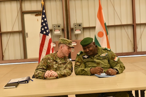 U.S. Air Force Maj. Gen. Kenneth Ekman, Department of Defense West Africa Coordination Element lead, U.S. Africa Command, and Nigerien Chief of Army Staff Col. Maj. Mamane Sani Kiaou, address the media during a turnover event marking the official turnover of the U.S. compound on Air Base 201 in Agadez, Aug. 5, 2024. (U.S. Air Force photo by 1st Lt. Natalie Stanley)