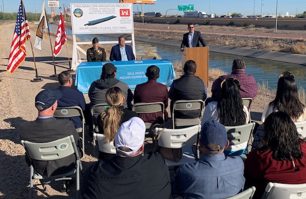 Michael Connor, assistant secretary of the Army for Civil Works, at the lectern, joins the Gila River Indian Community and the U.S. Army Corps of Engineers to commemorate a project partnership agreement signing during a ceremony Nov. 9, 2023, at the Gila River Indian Reservation in Arizona. This project is scheduled to be the first solar-over-canal project constructed in the U.S.