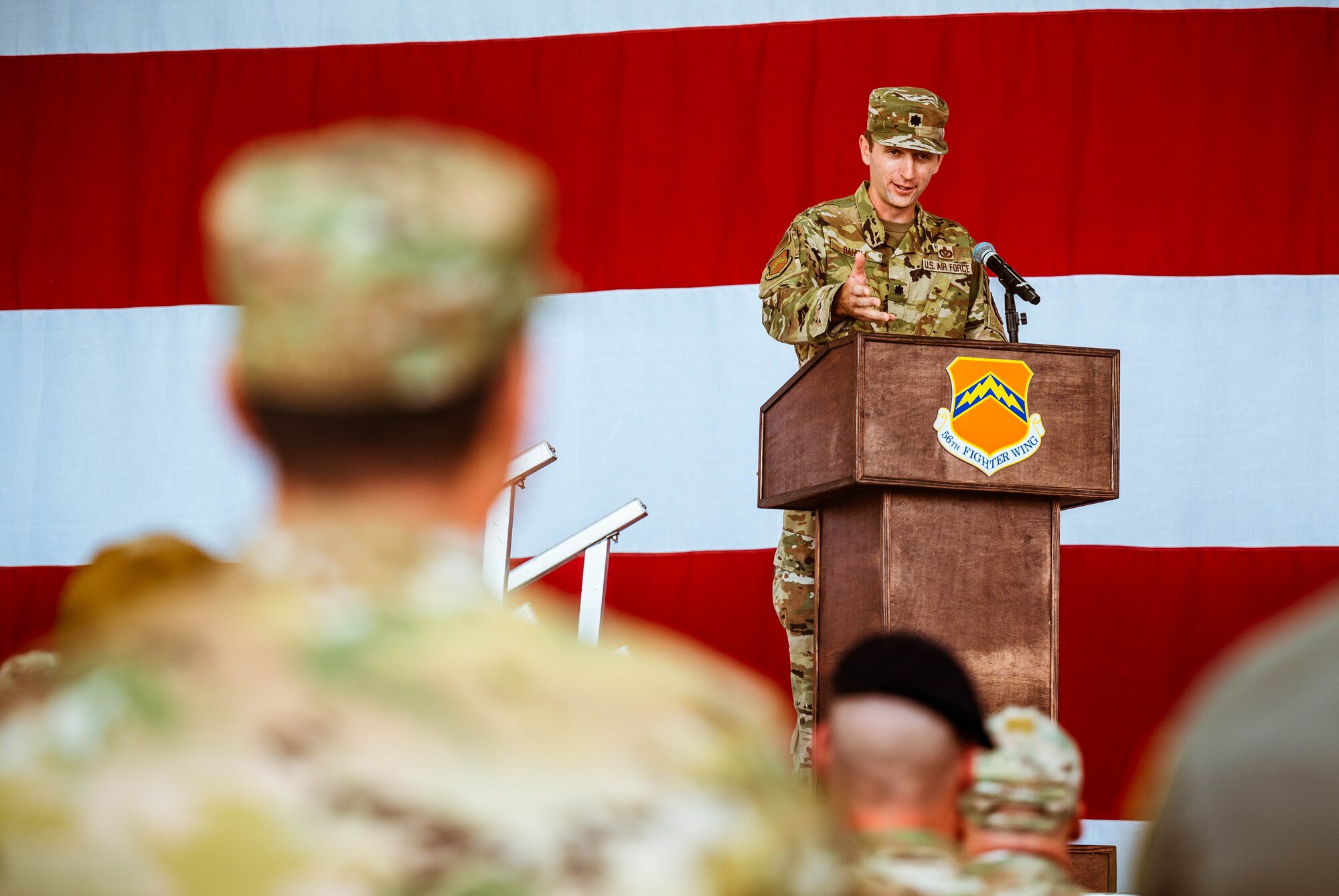 U.S. Air Force Lt. Col. Chris Bahrij, 13th Combat Air Base Squadron commander, addresses the crowd following the 13th CABS assumption of command ceremony, Aug. 5, 2024, at Luke Air Force Base, Arizona.