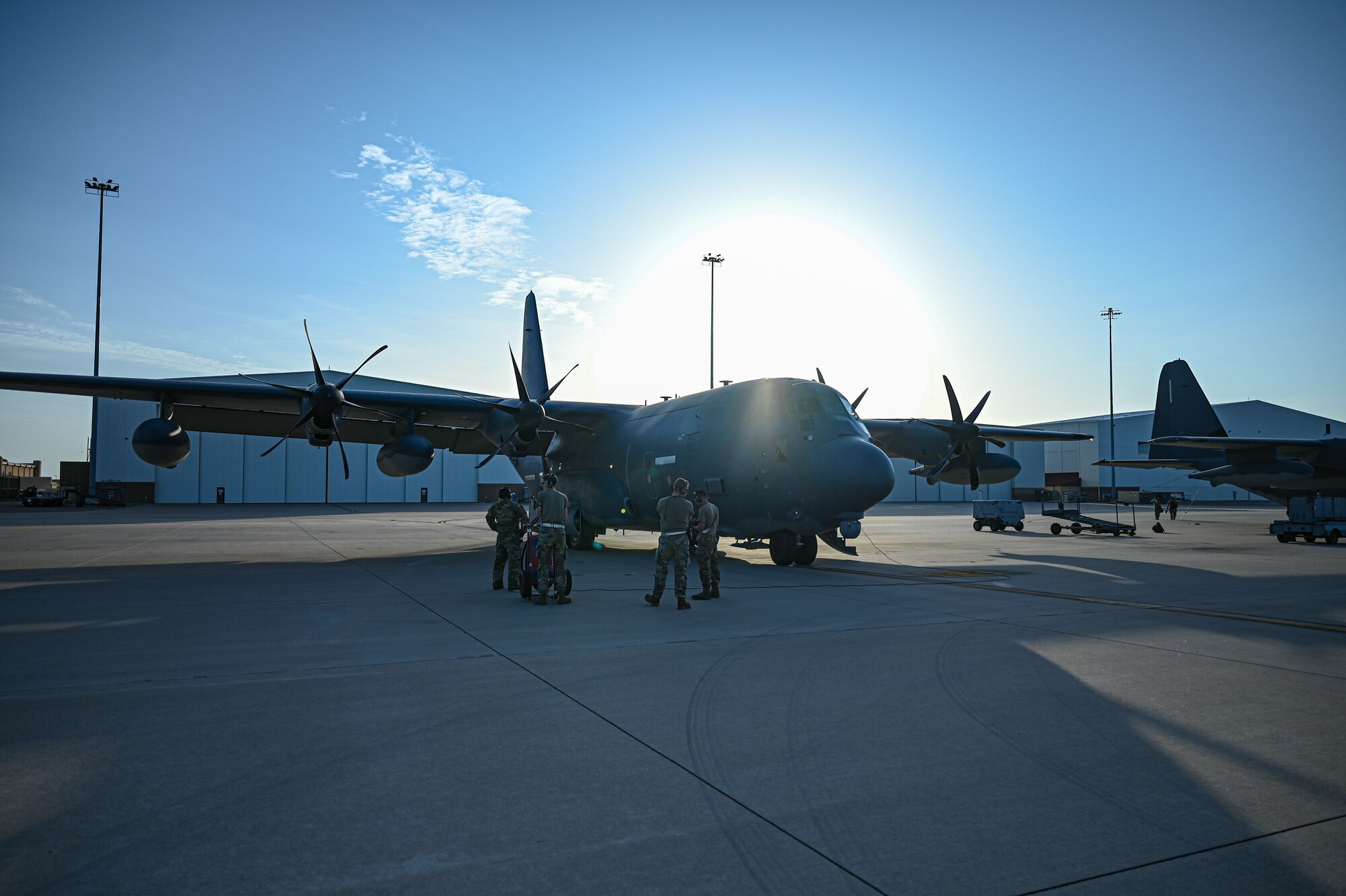Airmen of the 9th Special Operations Aircraft Maintenance Squadron perform pre-flight inspections on a 9th Special Operations Squadron MC-130J Commando II at Cannon Air Force Base, New Mexico, Aug. 2, 2024. The inspection ensured both aircraft could safely conduct a flyover to honor U.S. Air Force Lt. Gen. Tony D. Bauernfeind as he became the 22nd U.S. Air Force Academy superintendent in Colorado Springs, Colorado.  (U.S. Air Force photo by Airman 1st Class Gracelyn Hess)
