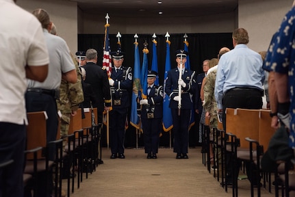 A U.S. Air Force color guard team presents the colors at the retirement ceremony of U.S. Air Force Brig. Gen. Rick L. Mutchler, Oklahoma National Guard Chief of Staff-Air, at Will Rogers Air National Guard Base, Oklahoma City, Aug. 3, 2024. As chief of staff, Mutchler played a pivotal role in ensuring the combat readiness and operational effectiveness of the Oklahoma Air National Guard by providing invaluable guidance and support to over 2,300 Airmen across two wings, significantly enhancing the Guard’s ability to fulfill community, state and federal missions. (U.S. Air National Guard photo by Airman Kaedin Teel)