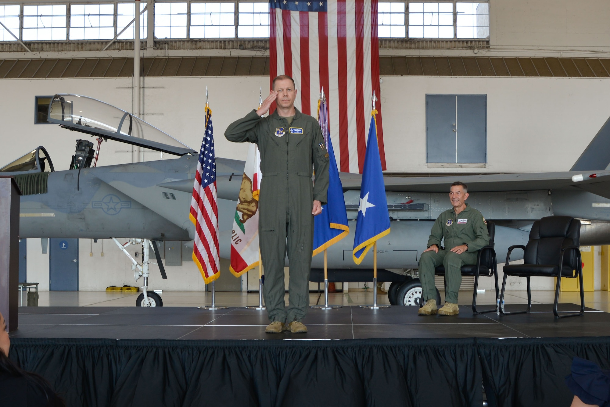 Col. Joel Pauls returns his first salute to 144th Fighter Wing Airmen during an assumption of command ceremony, Aug. 4, 2024, at the Fresno Air National Guard Base, Calif. Assumption of command ceremonies are a long-standing military tradition signifying the transfer of authority from a departing commander to the incoming commander.
