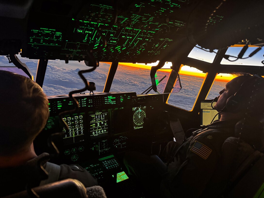 U.S. Coast Guard Lt. Junior Grade Nick Fuist and Lt. Cmdr. Keith Arnold , two pilots at U.S. Coast Guard Air Station Barbers Point, man the controls of a Coast Guard Air Station Barbers Point HC-130 Super Hercules in the skies above Auckland, New Zealand, Jul. 9, 2024. The U.S. Coast Guard completed participation in Operation Nasse, a three-month operation conducted by Australia, France, New Zealand, and the U.S. to safeguard the invaluable marine resources of Pacific Island nations and the Western Central Pacific Ocean (U.S. Coast Guard photo by Petty Officer 2nd Class Nicholas Martino)