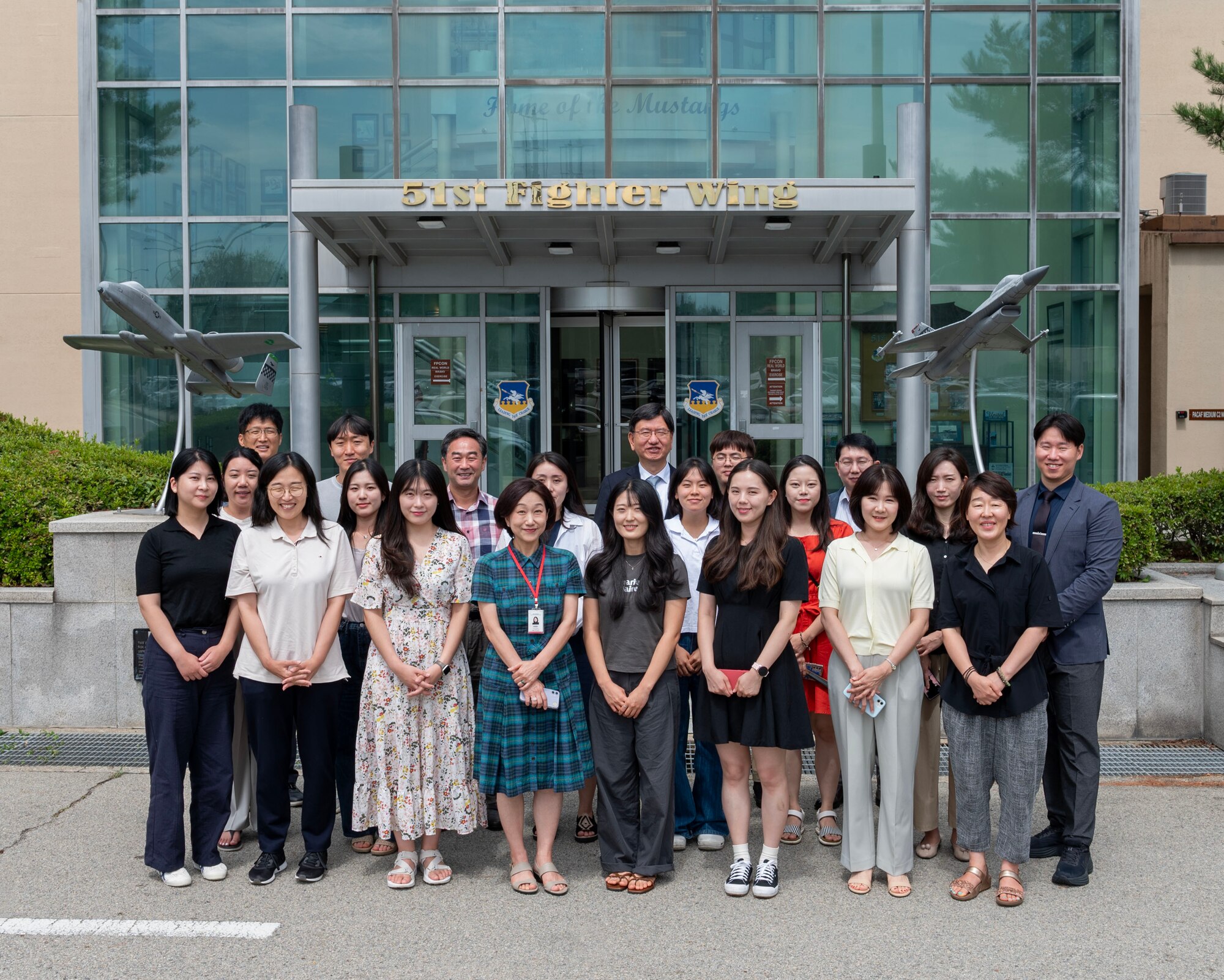Members from the Pyeongtaek International Exchange Foundation take a group photo after receiving a base tour at Osan Air Base, Republic of Korea, Aug. 6, 2024. Established by Pyeongtaek City in 2014, PIEF has been a partner in enhancing community outreach and supporting events with Osan AB. This collaboration has been crucial in building strong relationships between the local community and the members of the base. (U.S. Air Force photo by Staff Sgt. Aubree Owens)