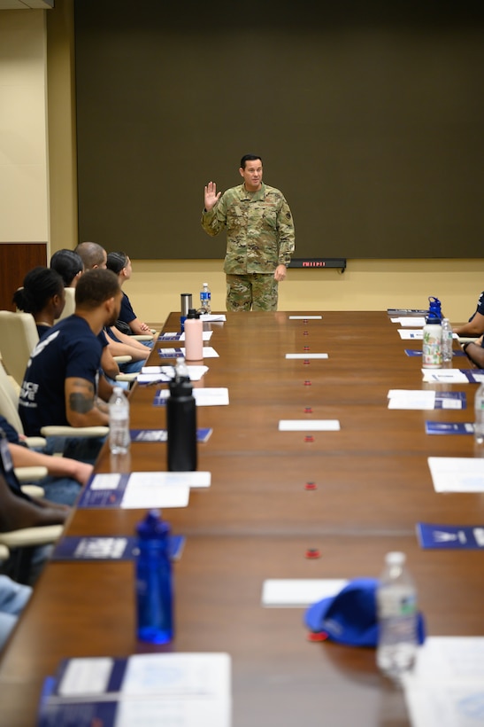 Brig. Gen. Kevin Merrill, director of Strategic Plans, Programs and Requirements, Air Force Reserve Command, speaks to Development and Training Flight trainees about how they will play a critical role in the future of the Reserve during their unit training assembly weekend immersion tour of AFRC, Robins Air Force Base, Ga. Aug. 3, 2024.