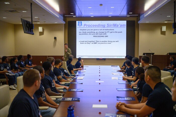 Tech. Sgt. Jefferson Sanderson, Development and Training Flight coordinator assigned to the 315th Airlift Wing, Joint Base Charleston, South Carolina, reviews customs and courtesies with trainees during their unit training assembly weekend immersion tour of Air Force Reserve Command headquarters, Robins Air Force Base, Ga. Aug. 3, 2024.