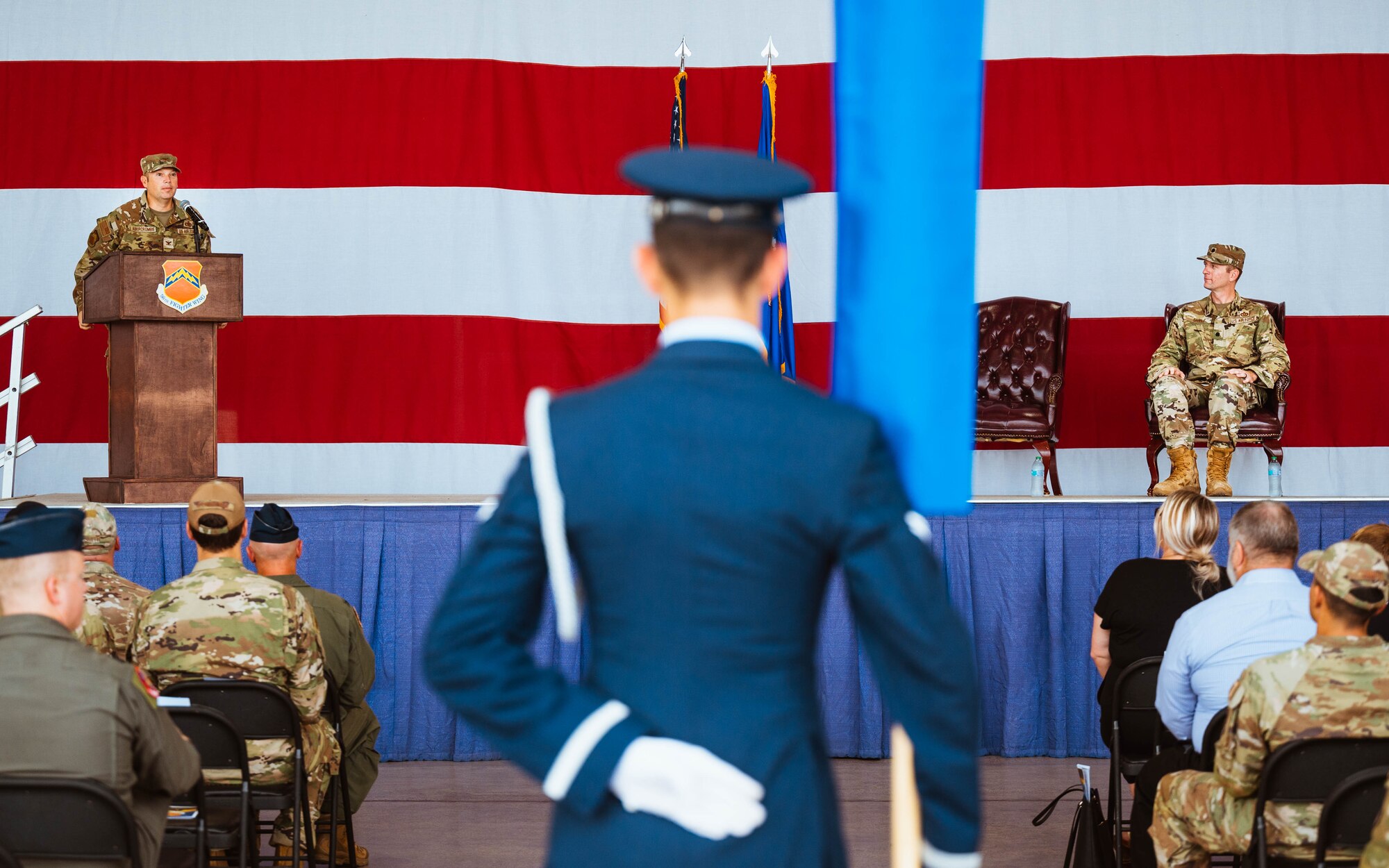 U.S. Air Force Col. Peter Abercrombie (left), 56th Mission Support Group commander, addresses the crowd during the 13 Combat Air Base Squadron assumption of command ceremony, Aug. 5, 2024, at Luke Air Force Base, Arizona.