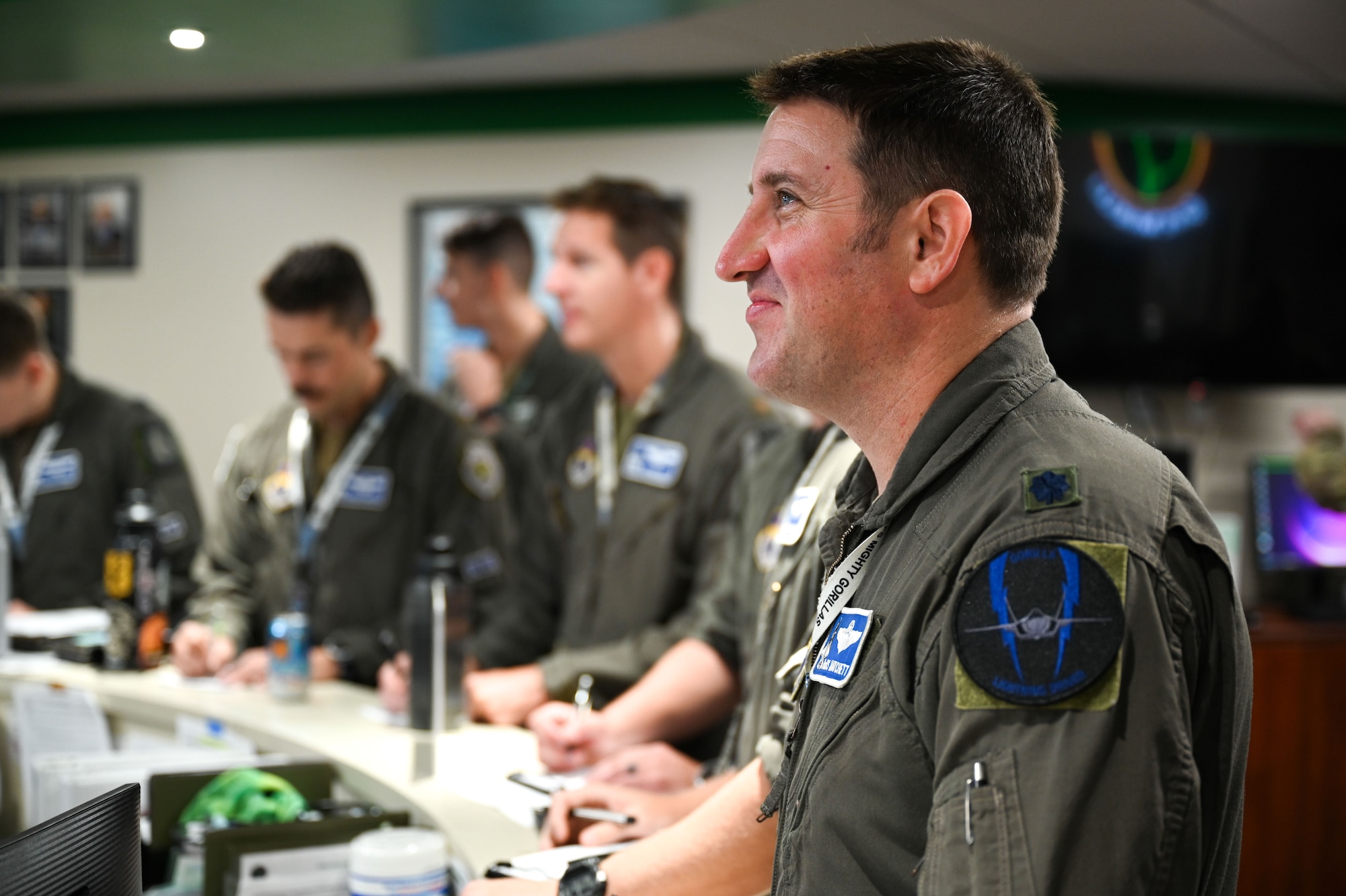U.S. Air Force Lt. Col. John Matchett, 33rd Operations Group Deputy Commander, receives a pre-flight brief at Eielson Air Force Base, Alaska, July 25, 2024.