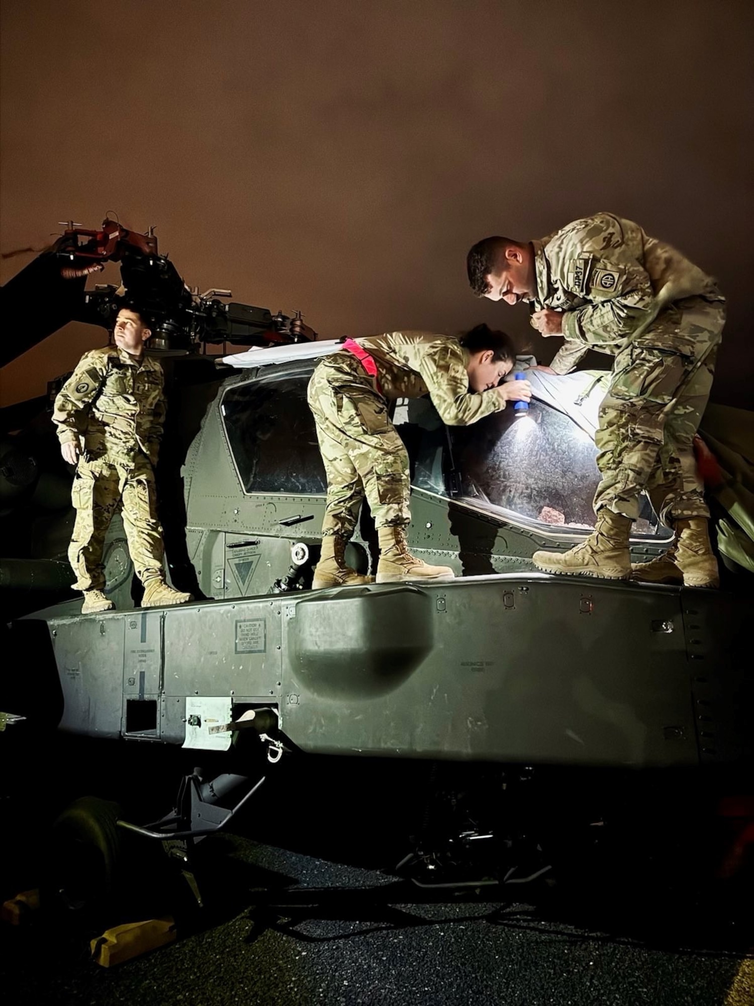 Aerial porters from the 387th Air Expeditionary Squadron’s Quick Reaction Team prepare cargo