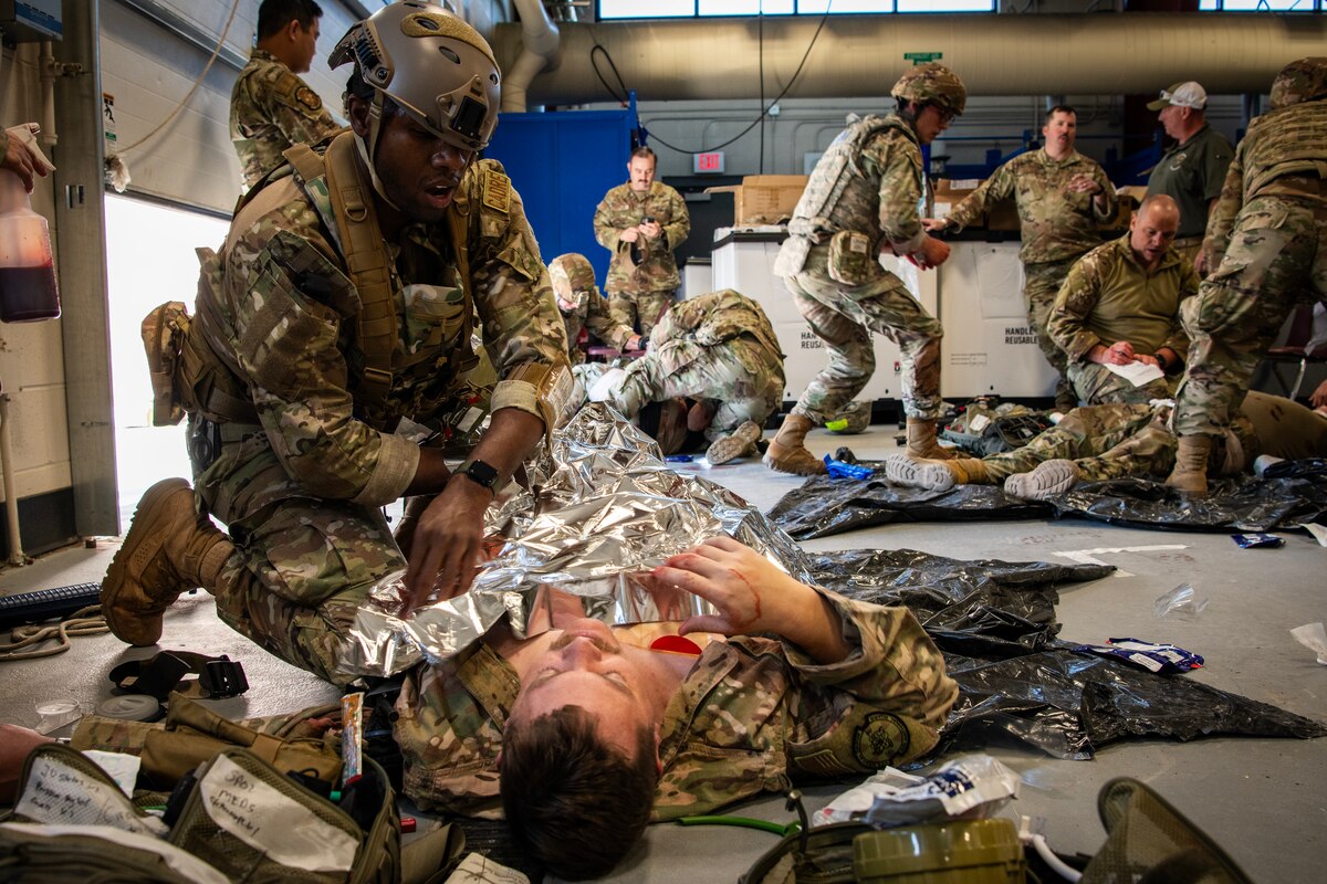 Image of Airmen conducting support with civilians.