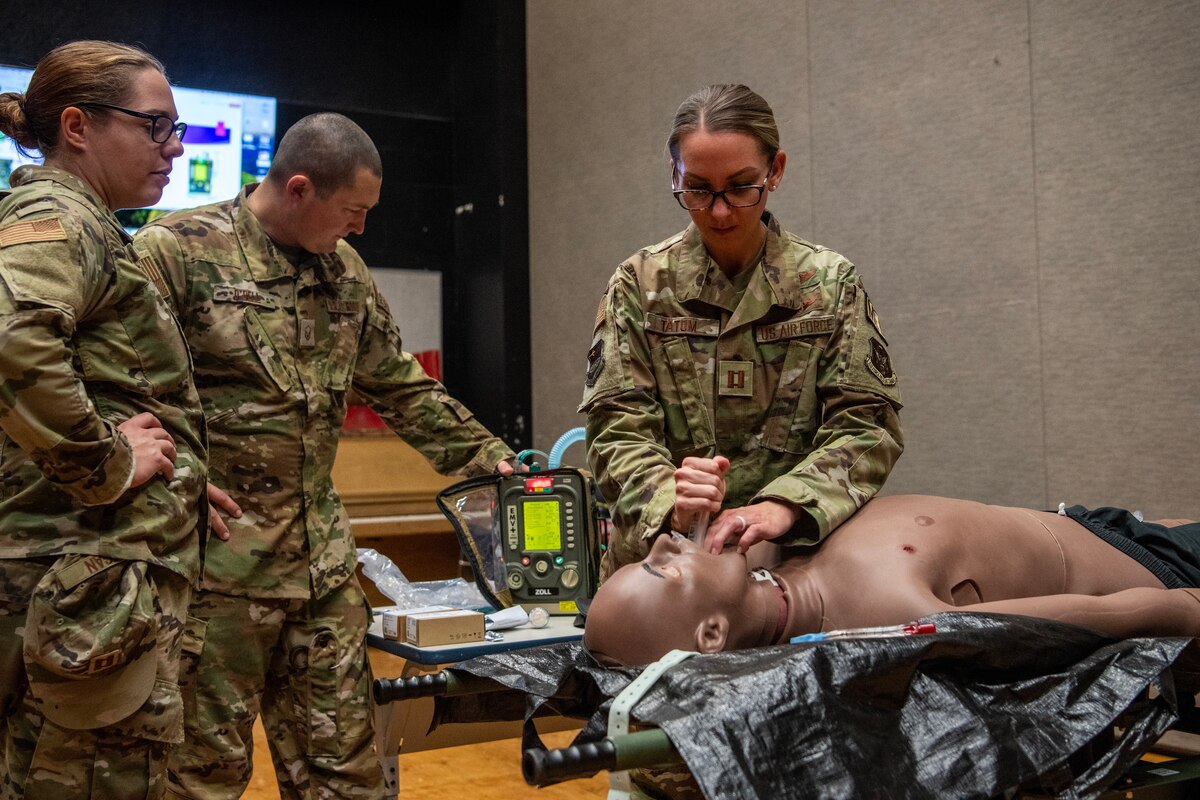 Image of Airmen conducting support with civilians.