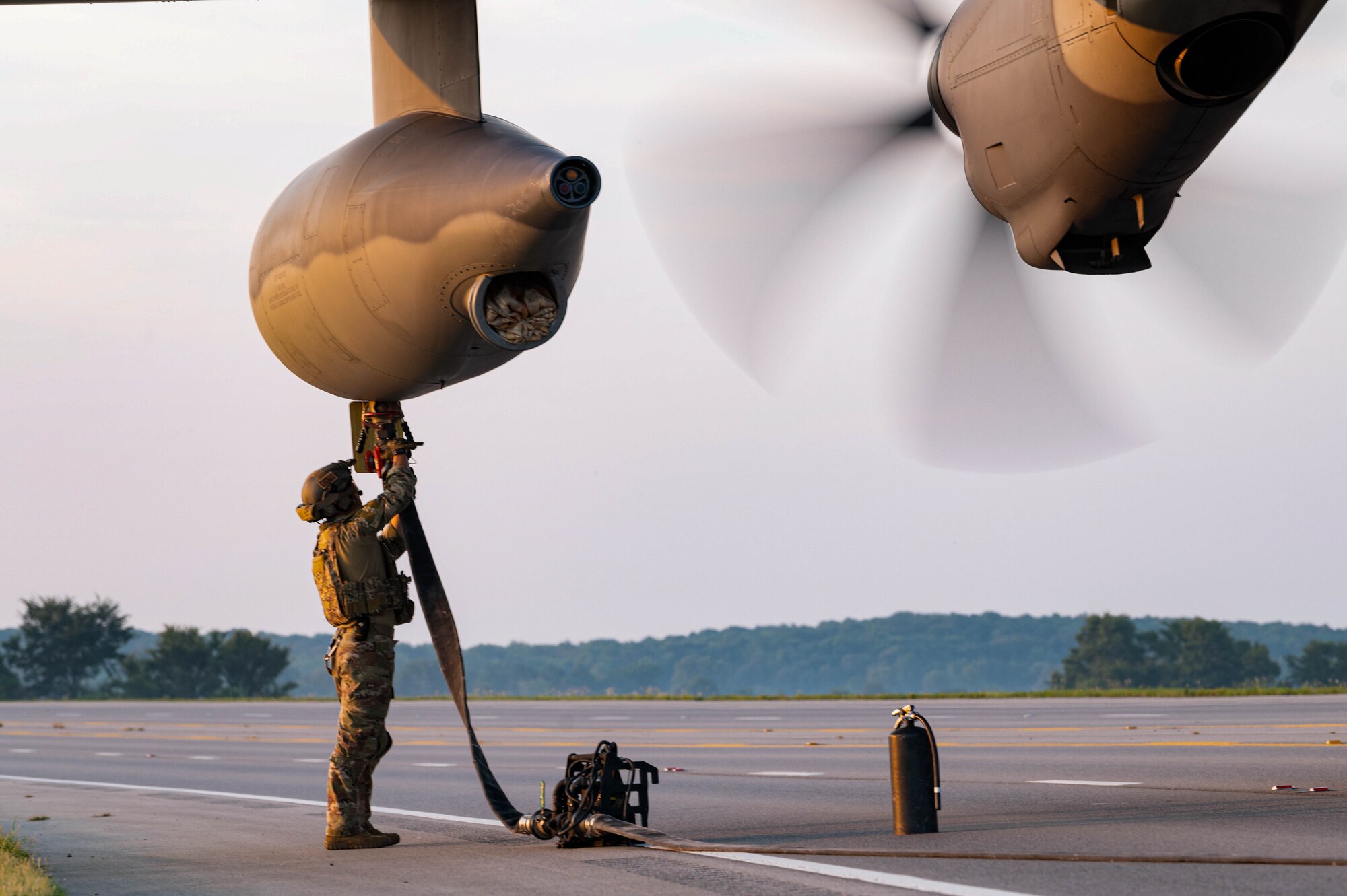 A U.S. Air Force Airman assigned to the 1st Special Operations Wing, conducts Forward Arming and Refueling Point operations during Emerald Warrior 24 FTX II highway landing operation in Bono, Arkansas, August 4, 2024.