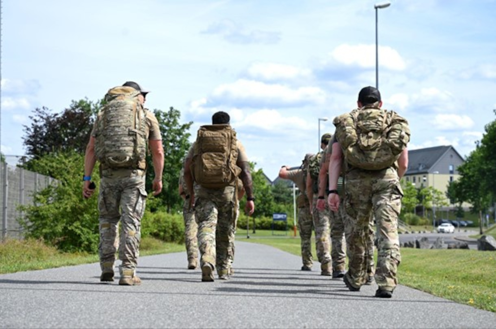 U.S. Airmen assigned to the 2nd Air Support Operations Squadron march as a group during the 13th annual Tactical Air Control Party 24-hour run challenge at U.S. Army Garrison Bavaria, Germany, July 26, 2024. TACP Airmen undergo intense physical and mental training in order to withstand the demanding conditions of battle, exemplifying the commitment to serving their brethren on the battlefield. (U.S. Air Force photo by Senior Airman Renan Arredondo)