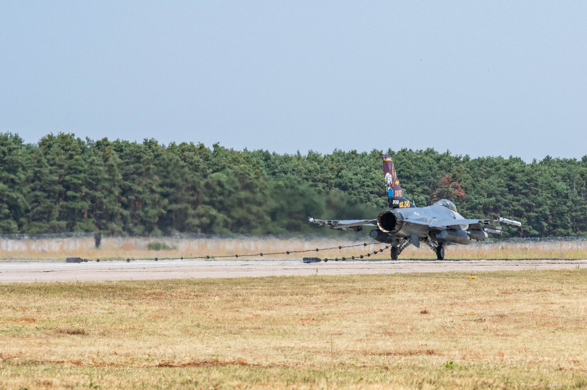 A new Barrier Arresting Kit-12 passes a certification test by successfully decelerating a U.S. Air Force F-16 Fighting Falcon, assigned to the 31st Fighter Wing, at Malacky Air Base, Slovakia, July 10, 2024. The BAK-12 installation aims to increase collaboration and responsiveness to global challenges by widening the scope of operating locations and strengthening the partnership with Slovakia as a North Atlantic Treaty Organization ally. (U.S. Air Force photo by Airman 1st Class Eve Daugherty)