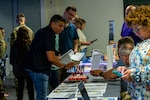 group of people looking at vendor tables
