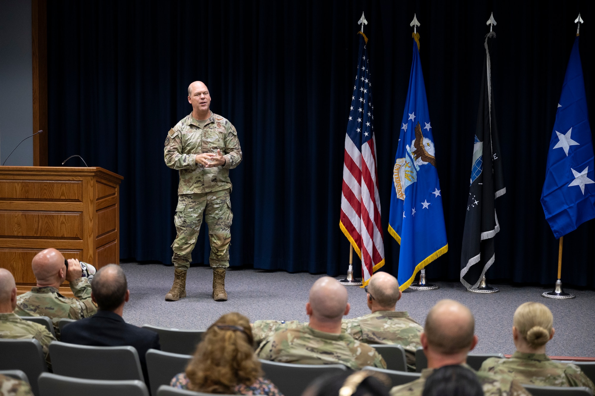 A man speaks to a crowd.