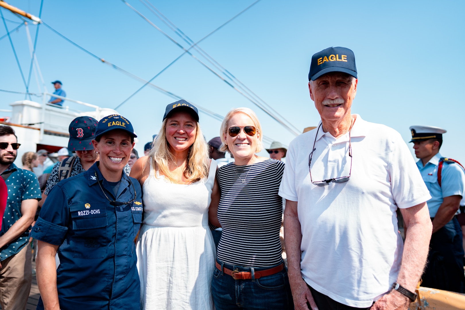 U.S. Coast Guard Capt. Jessica Rozzi-Ochs, left, Mayor of Rockland, Maine, Nicole Kalloch, Rockland City Council member Penelope York, Maine Senator Angus King, right, pose for a group photo aboard Coast Guard Cutter Eagle (WIX 327) in Rockland, Maine, Aug. 2, 2024. Eagle, the Coast Guard’s First District and Station Rockland celebrated Rockland recertifying as an official Coast Guard City.