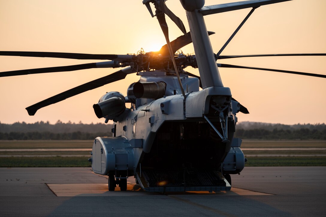 A U.S. Marine Corps CH-53K King Stallion with Marine Heavy Helicopter Squadron (HMH) 461 is parked on a runway postflight during Exercise Northern Strike (NS 24-2) 2024 at Grayling Army Airfield, Grayling, Michigan, Aug. 2, 2024. NS 24-2 is a premier reserve component training event that focuses on joint readiness training to build interoperability and strengthen partnerships in an all-domain environment. (U.S. Marine Corps photo by Lance Cpl. Bryan Giraldo)