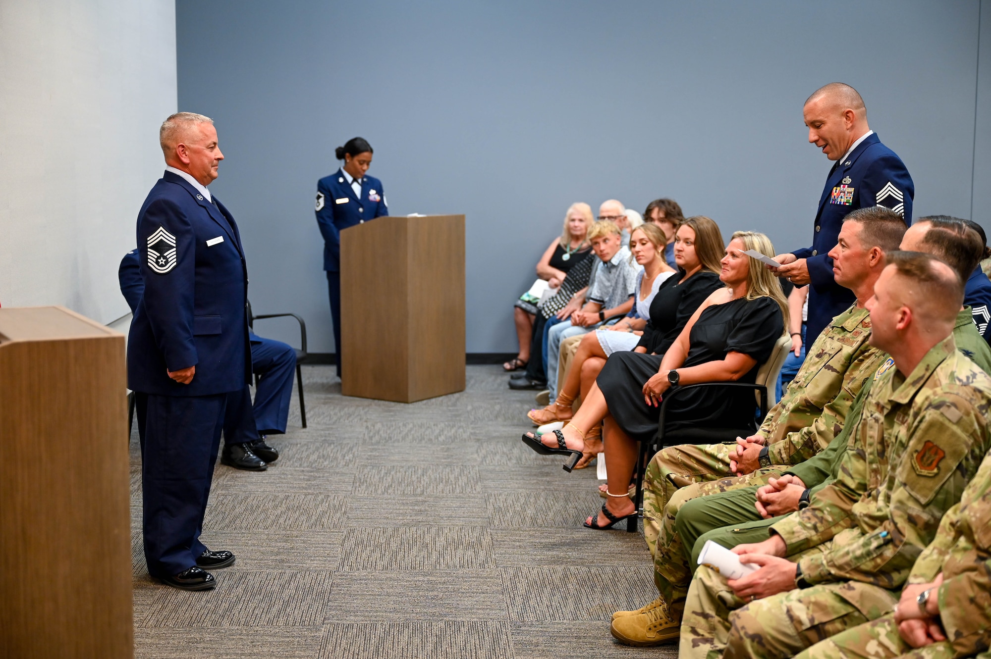 Chief Landon Bonds reads the Chief’s Promise during Chief Master Sergeant Kevin D. Brannan’s promotion ceremony on August 3, 2024 at U.S. Naval Air Station Joint Reserve Base Fort Worth, Texas. Brannan serves as the Senior Air Reserve Technician and Aerial Port Manager for the 73rd Aerial Port Squadron.