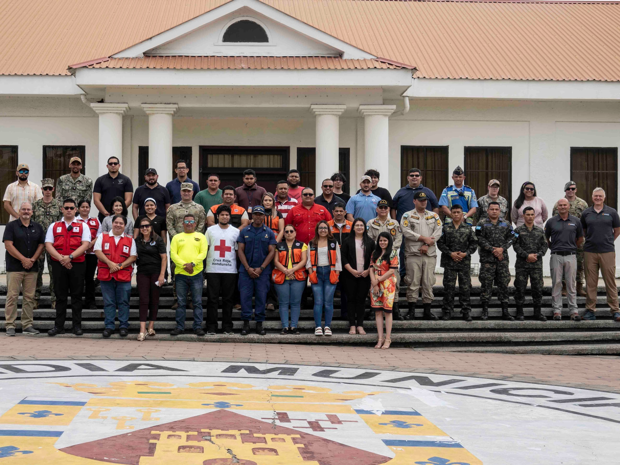 A photo of a group of people posing for a photo.