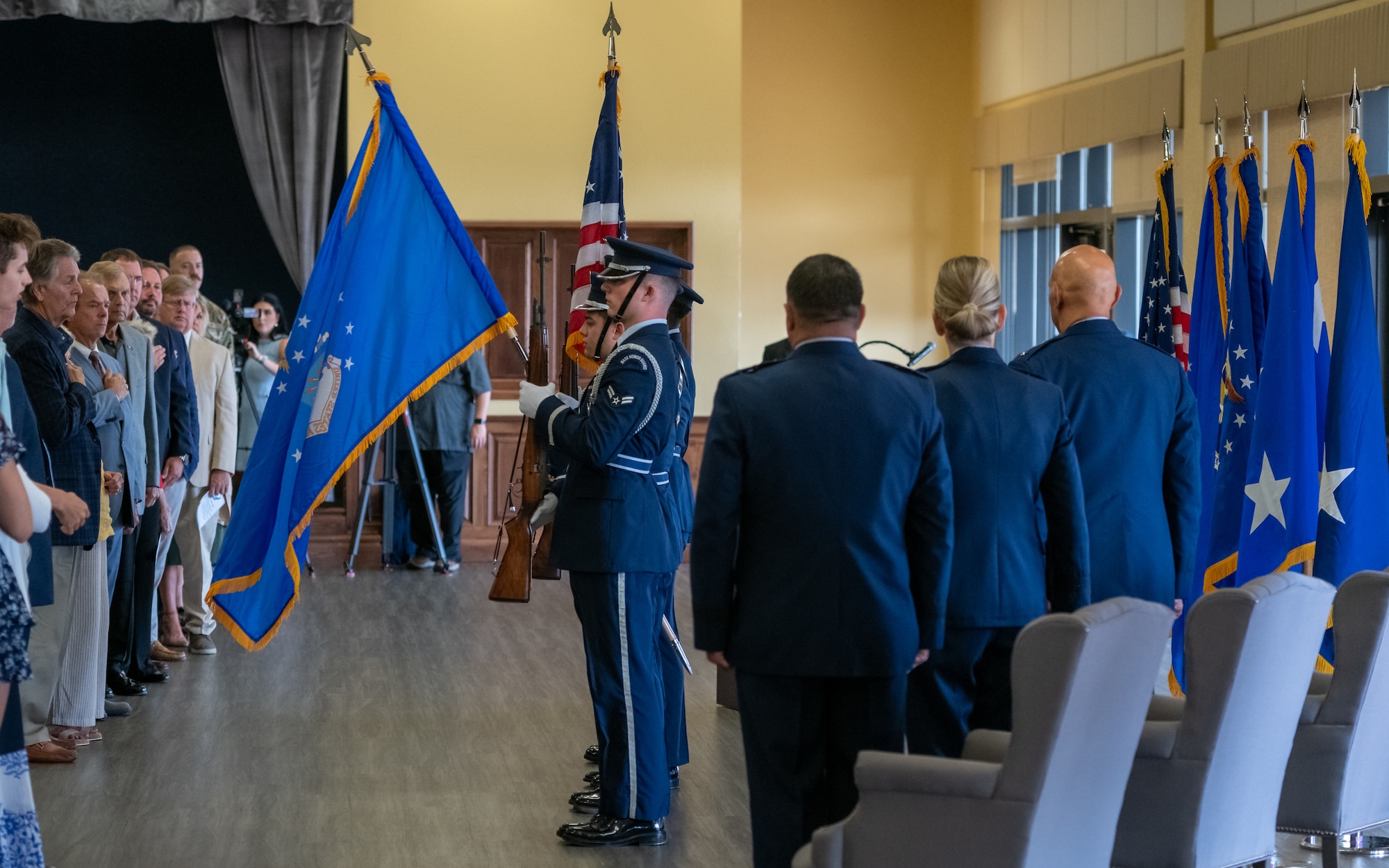 Members of the Keesler Honor Guard present the colors during the  Second Air Force change of command ceremony inside the Bay Breeze Event Center at Keesler Air Force Base, Mississippi, Aug 2, 2024.