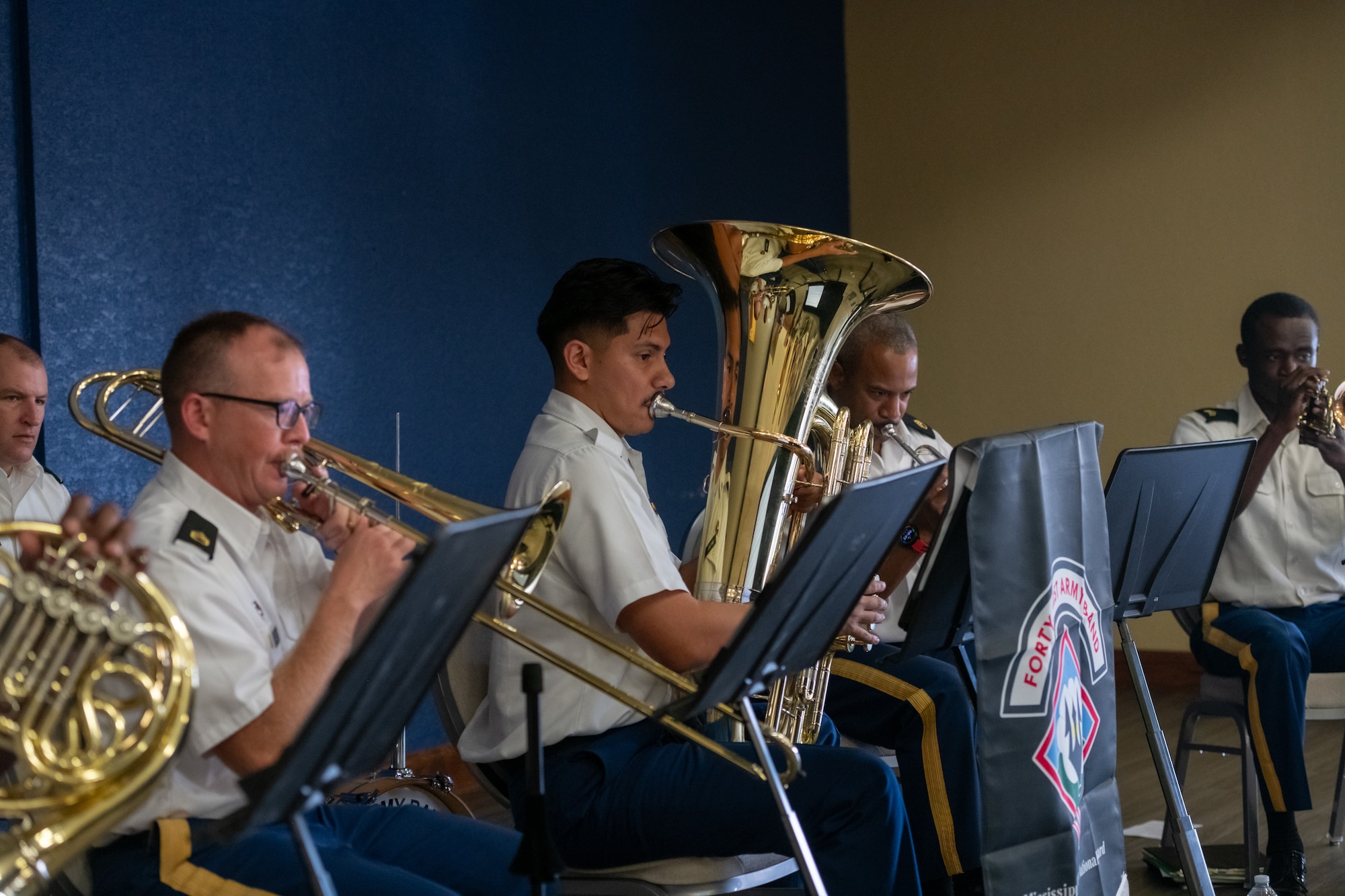 The Mississippi Army National Guard, 41st Army Band, plays music during the Second Air Force change of command ceremony inside the Bay Breeze Event Center at Keesler Air Force Base, Mississippi, Aug 2, 2024.