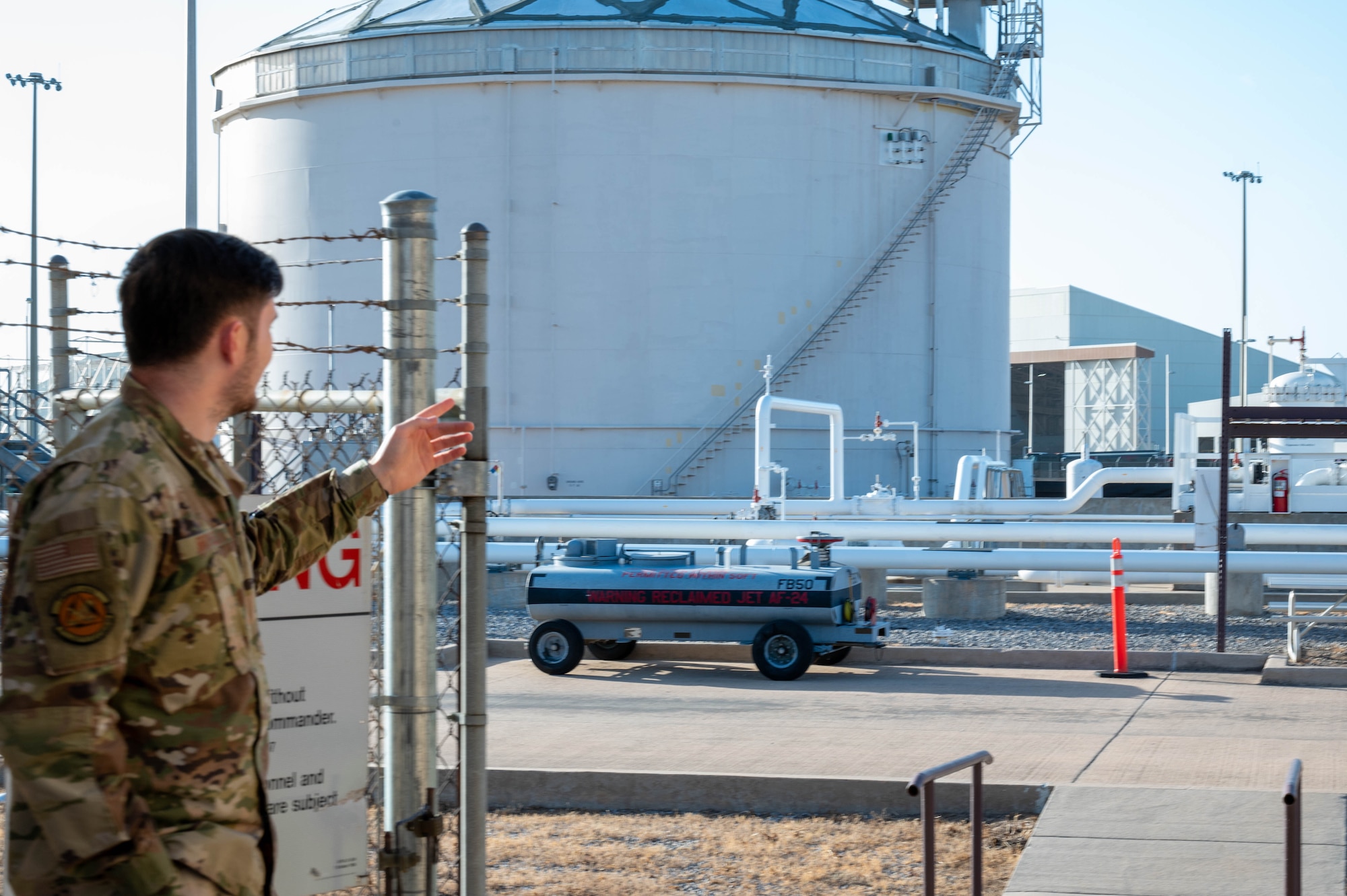 U.S. Air Force Staff Sgt. Alex Broyles, 97th Logistic Readiness Squadron noncommissioned officer in charge of fuel knowledge operations, showcases the base pipeline at Altus Air Force Base, Oklahoma, July 2, 2024. The pipeline became operational in April 2024, providing immediate access to fuel. (U.S. Air Force photo by Airman 1st Class Heidi Bucins)
