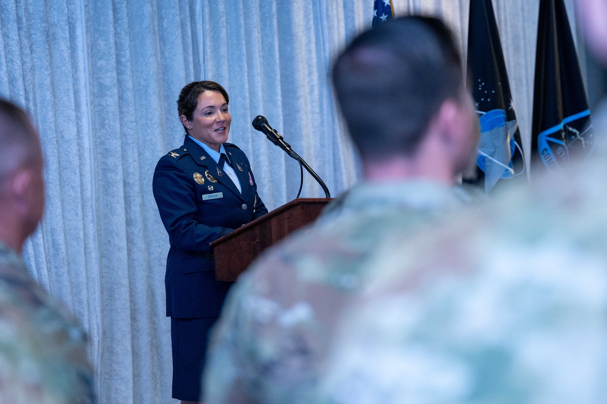 U.S. Space Force Col. Shannon DaSilva, incoming Space Delta 10 commander, delivers remarks during the Delta 10 change of command ceremony at Patrick Space Force Base, Aug. 7, 2024.