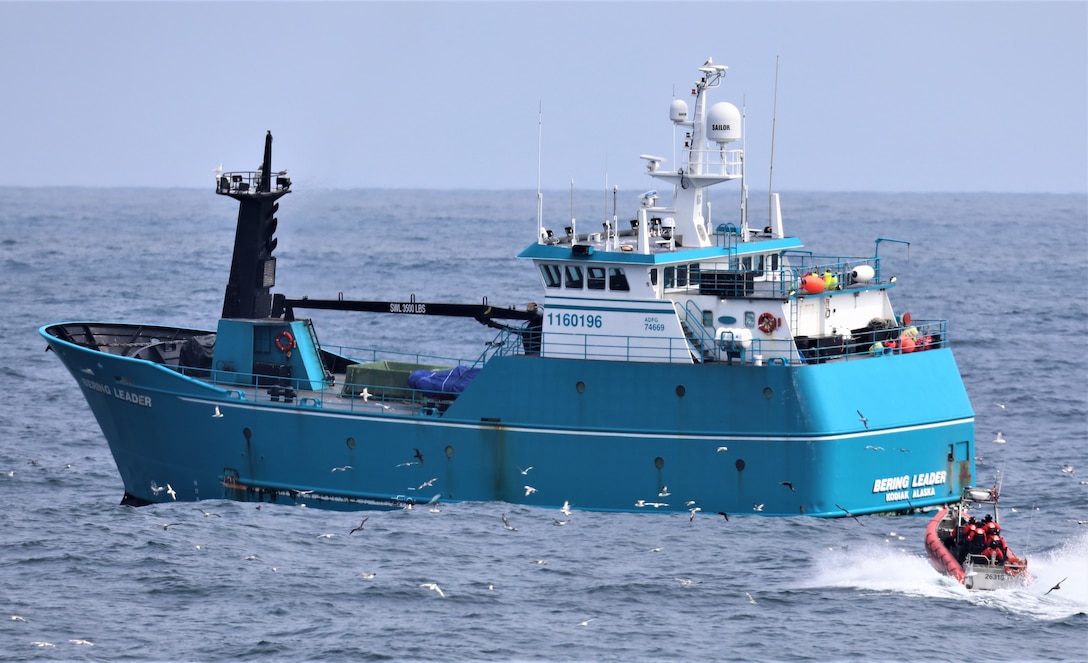 A Coast Guard Cutter Kimball (WMSL 756) law enforcement boarding team approaches the F/V Bering Leader to conduct a living marine resources boarding while Kimball’s crew patrols the Bering Sea, May 25, 2024. Kimball’s crew ensured fishing vessels in the Bering Sea were within compliance of all federal fishery conservation laws and safety requirements through the completion of twenty living marine resources boardings during their 122-day patrol throughout the region. U.S. Coast Guard photo by Petty Officer 1st Class Ethan Isberner.