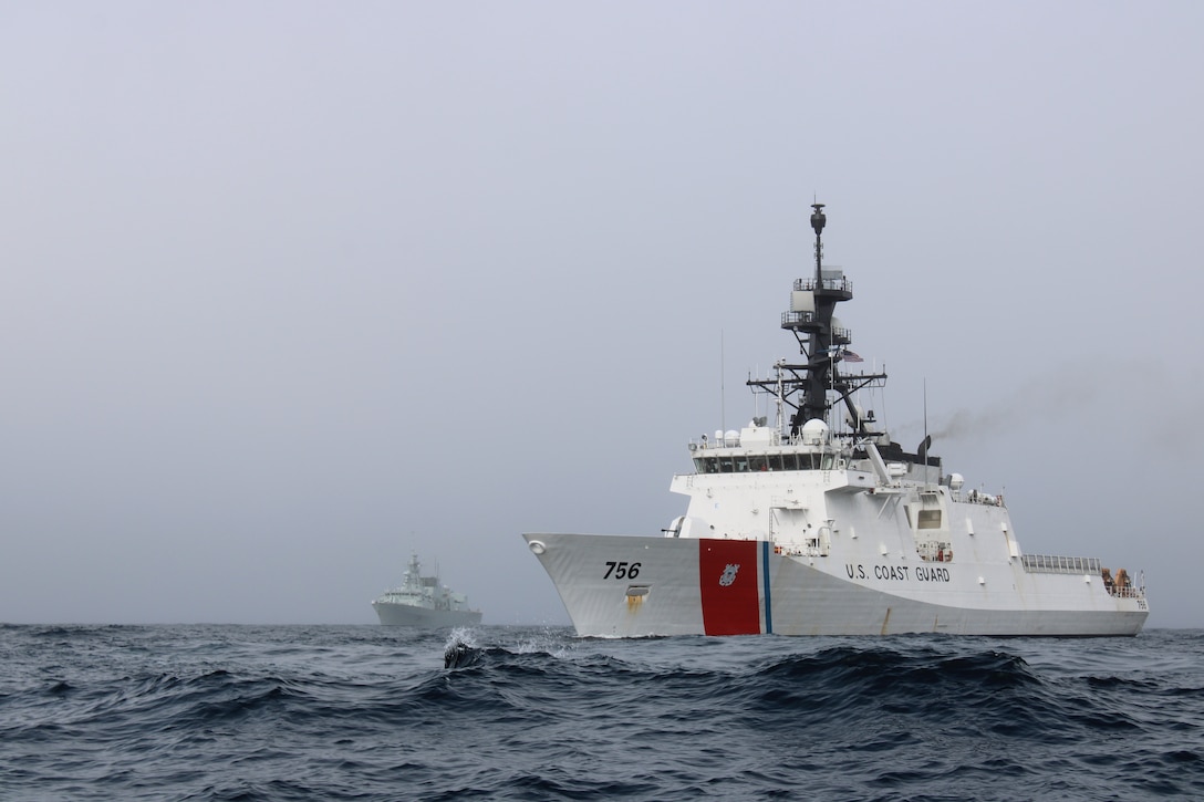 U.S. Coast Guard Cutter Kimball (WMSL 756) conducts a passing exercise with the Royal Canadian Navy ship HMCS Regina while Kimball patrols the Bering Sea, July 18, 2024. During Kimball’s 122-day patrol, the crew also interacted with strategic partners in Victoria, Canada, strengthening relationships by focusing on shared interests in the Bering Sea and the expanding Artic region. U.S. Coast Guard photo by Ensign James Bongard.