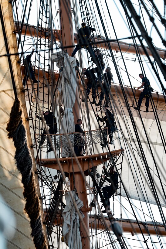 Coast Guard Academy Cadets climb the rigging of Coast Guard Cutter Eagle (WIX 327) while underway July, 30, 2024. The Eagle serves as a classroom at sea for Academy Cadets and future leaders in the Coast Guard.