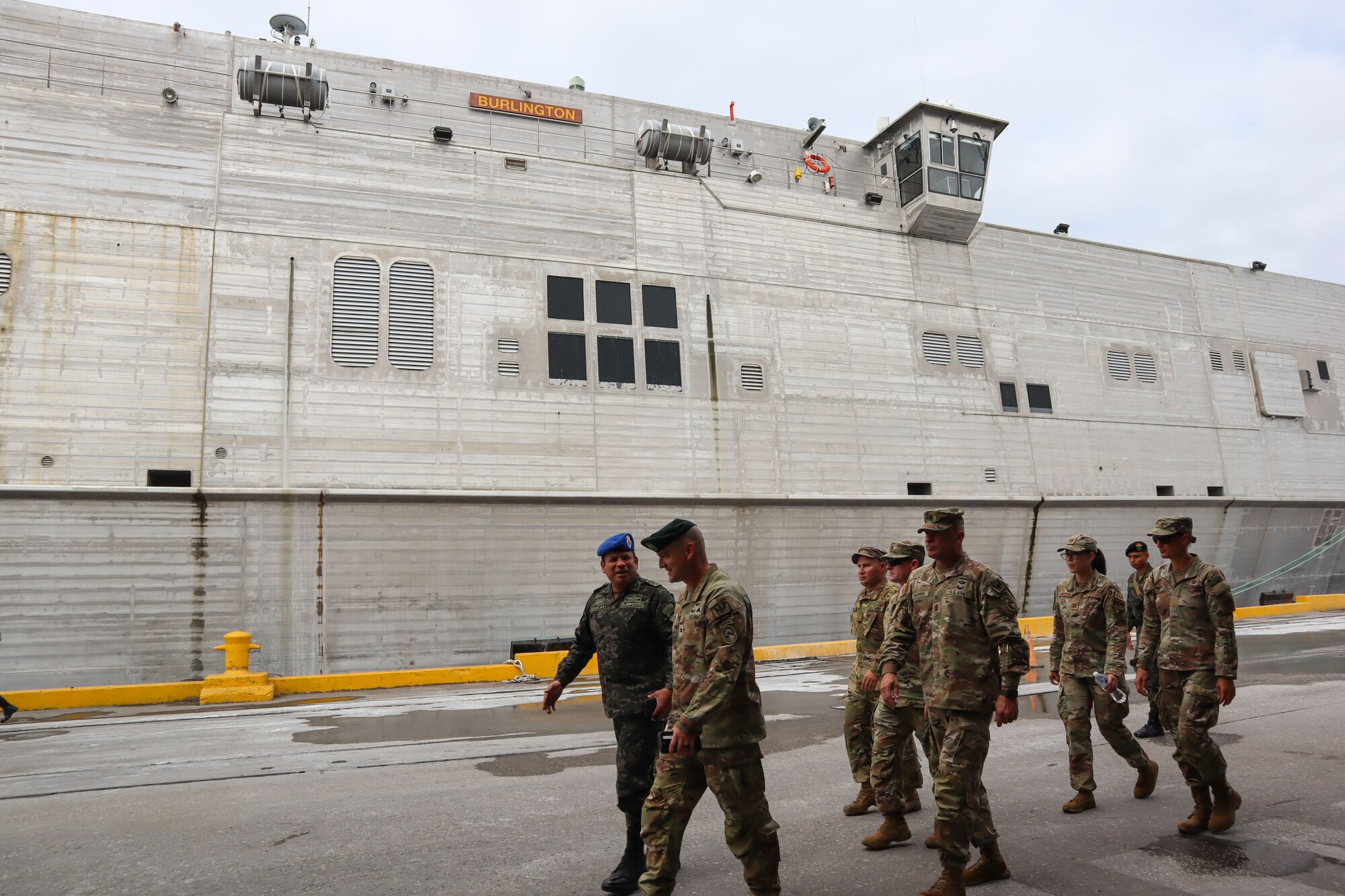 A photo of military members walking together.