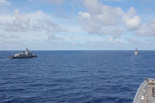 SOUTH CHINA SEA (August 7, 2024) The Ticonderoga-class guided-missile cruiser USS Lake Erie (CG 70) right, sails in formation with the Philippine Navy’s Jose Rizal-class frigate BRP Jose Rizal (FF 150), left, and the Gregorio del Pilar-class patrol ship Ramon Alcaraz (PS 16), during a quadrilateral Maritime Cooperation Activity exercise with the Australia, Canada, the Philippines and the U.S., Aug. 7, 2024, Aug. 7, 2024. Lake Erie is assigned to Destroyer Squadron (DESRON) 15, the Navy’s largest DESRON and the U.S. 7th Fleet’s principal surface force. 7th Fleet is the U.S. Navy’s largest forward-deployed numbered fleet, and routinely interacts and operates with allies and partners in preserving a free and open Indo-Pacific region. (U.S. Navy photo by Lt. j.g. Selena Esteban)