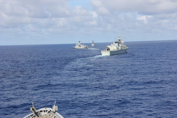 SOUTH CHINA SEA (Aug. 7, 2024) The Philippine Navy’s Gregorio del Pilar-class patrol ship BRP Ramon Alcaraz (PS 16), front, the Jose Rizal-class frigate BRP Jose Rizal (FF 150), left,  the Royal Canadian Navy Halifax-class frigate HMCS Montreal (FFH 336), right, and the Ticonderoga-class guided-missile cruiser USS Lake Erie (CG 70), sail in formation during a quadrilateral Maritime Cooperation Activity exercise with the Australia, Canada, the Philippines and the U.S., Aug. 7, 2024Lake Erie is assigned to Destroyer Squadron (DESRON) 15, the Navy’s largest DESRON and the U.S. 7th Fleet’s principal surface force. 7th Fleet is the U.S. Navy’s largest forward-deployed numbered fleet, and routinely interacts and operates with allies and partners in preserving a free and open Indo-Pacific region. (U.S. Navy photo by Lt. j.g. Selena Esteban)