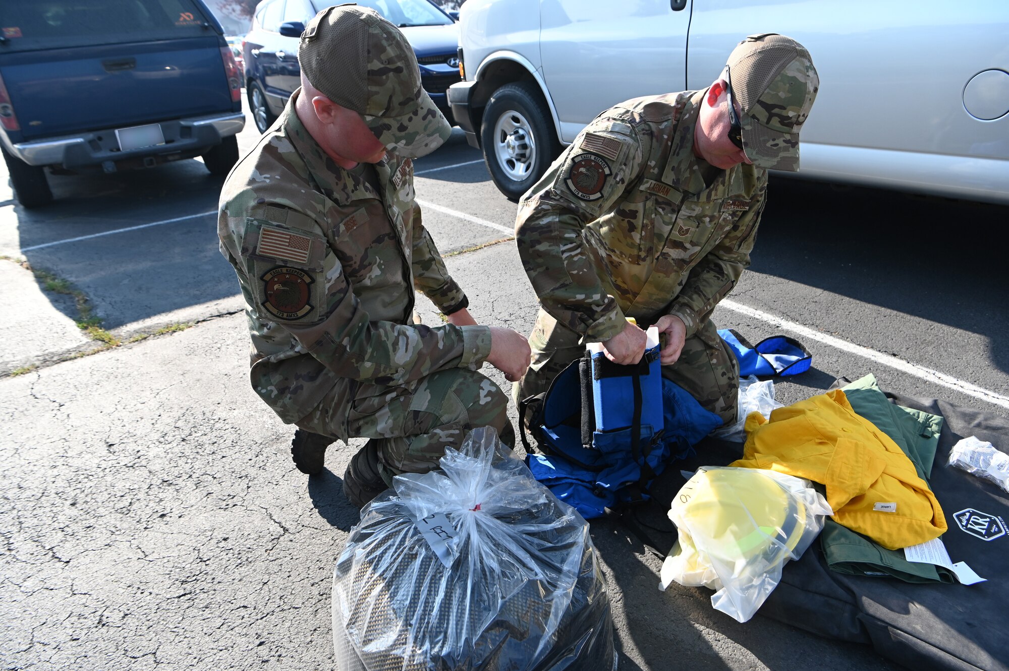 Airmen packing gear