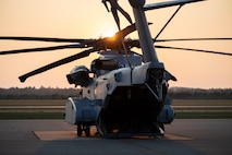 A U.S. Marine Corps CH-53K King Stallion with Marine Heavy Helicopter Squadron (HMH) 461 is parked on a runway postflight during Exercise Northern Strike (NS 24-2) 2024 at Grayling Army Airfield, Grayling, Michigan, Aug. 2, 2024. NS 24-2 is a premier reserve component training event that focuses on joint readiness training to build interoperability and strengthen partnerships in an all-domain environment. (U.S. Marine Corps photo by Lance Cpl. Bryan Giraldo)