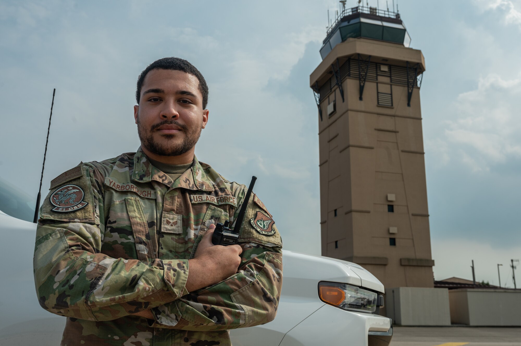 U.S. Air Force Senior Airman Shawn Yarborough, 51st Operational Support Squadron airfield management operations supervisor, poses for a photo at Osan Air Base, Republic of Korea, Aug. 6, 2024. Yarborough has improved his shop by being the primary coordinator for the activation of an alternate landing surface, allowing base aircraft to land on a shorter portion of the runway during emergencies or contingencies. (U.S. Air Force photo by Airman 1st Class Chase Verzaal)