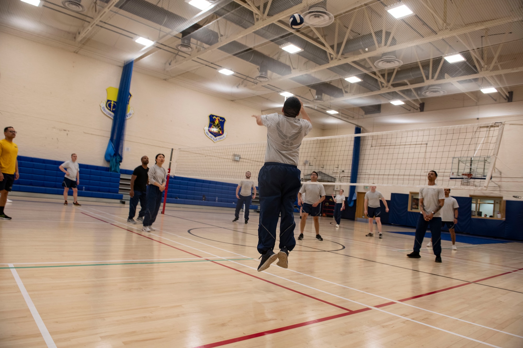 Airmen play volleyball