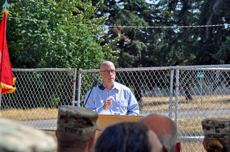Mr. Paul Farnan speaks to crowd at groundbreaking ceremony