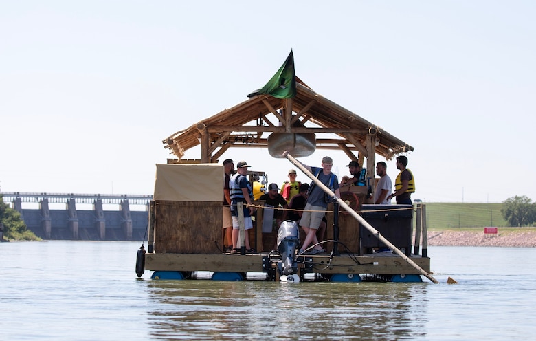 Counselors and students with Bald Eagle Boys Camp of Mills Hall, Pa., float their custom-designed raft up the Missouri River east of Gavins Point Dam on Aug. 2, 2024. The boys camp worked closely with the U.S. Army Corps of Engineers – Omaha District to work out the logistics for camping, reassembling their raft, and floating their 1,000-mile journey down the Missouri River. (U.S. Army photo by Josh Plueger)