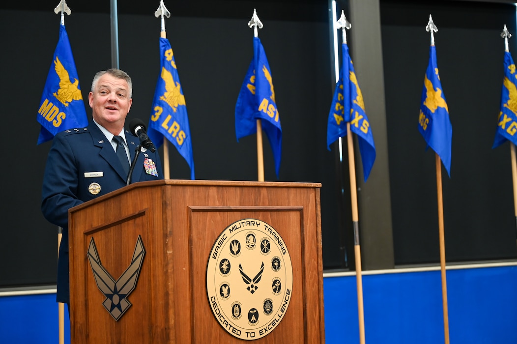 Maj. Gen. D. Scott Durham, 4th Air Force commander, addresses an audience of 433rd Airlift Wing Citizen Airmen and community members at the 433rd AW assumption of command ceremony for Col. Douglas C. Jeffrey, IV, at Joint Base San Antonio-Lackland, Texas, Aug. 4, 2024.