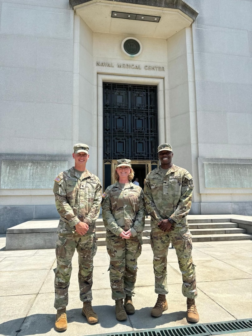 Army Col. Wendy Woodall (center), director for nursing and chief nursing officer at Walter Reed and the consultant to the Army Surgeon General for Medical/Surgical Nursing, welcomes Army ROTC Cadets and nursing students Adam Zimmerman (left) and Tahjee Dingle, from East Carolina University, to Walter Reed for the Nurse Summer Training Program.