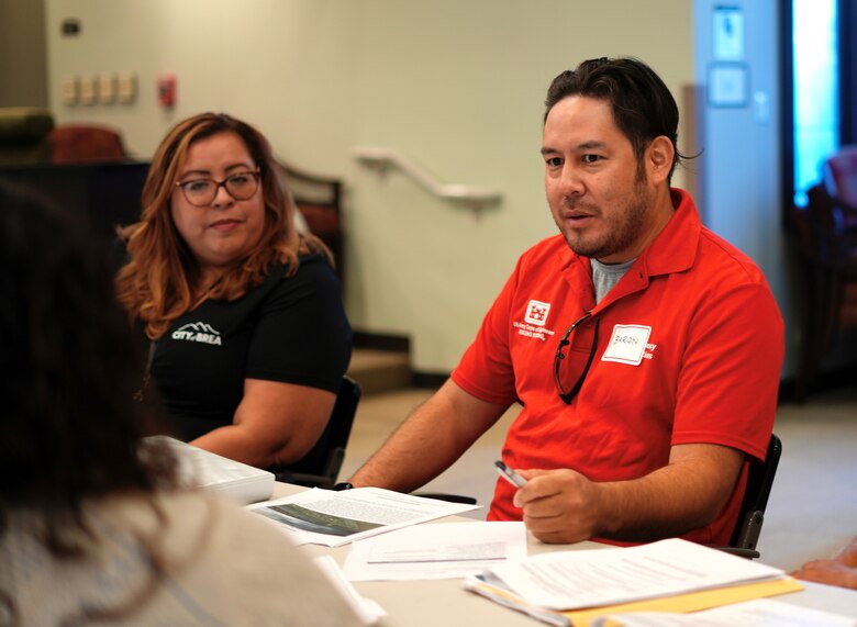 Right, Baron Arakawa, U.S. Army Corps of Engineers Los Angeles District civil engineer and Public Law 84-99 program manager, participates in a discussion with participants during the Carbon Canyon Dam tabletop exercise July 31, 2024, at the Yorba Linda Water District in Placentia, California.