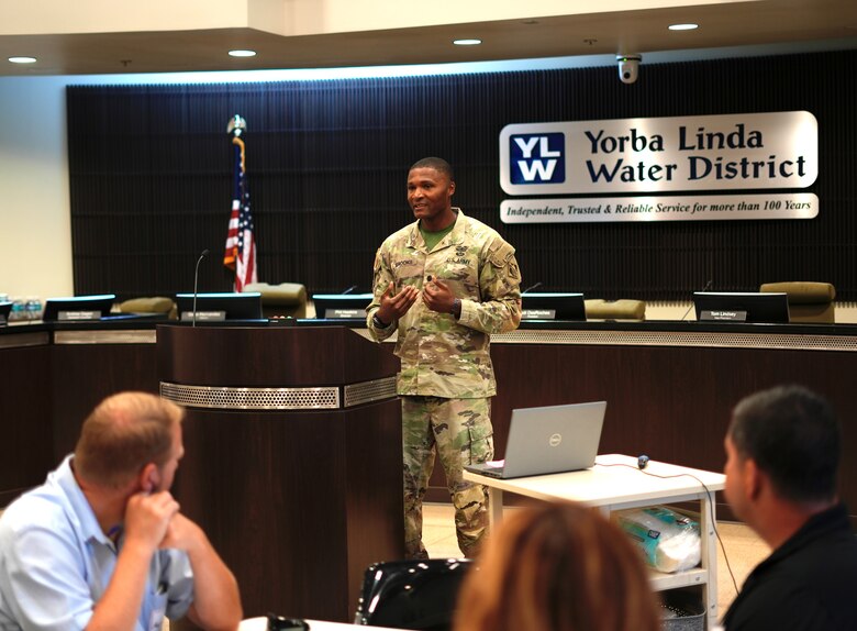 Lt. Col. Stephen Brooks, Los Angeles District deputy commander, talks to attendees of the Carbon Canyon Dam tabletop exercise July 31, 2024, at the Yorba Linda Water District in Placentia, California. Books stressed the importance of interagency emergency preparedness.