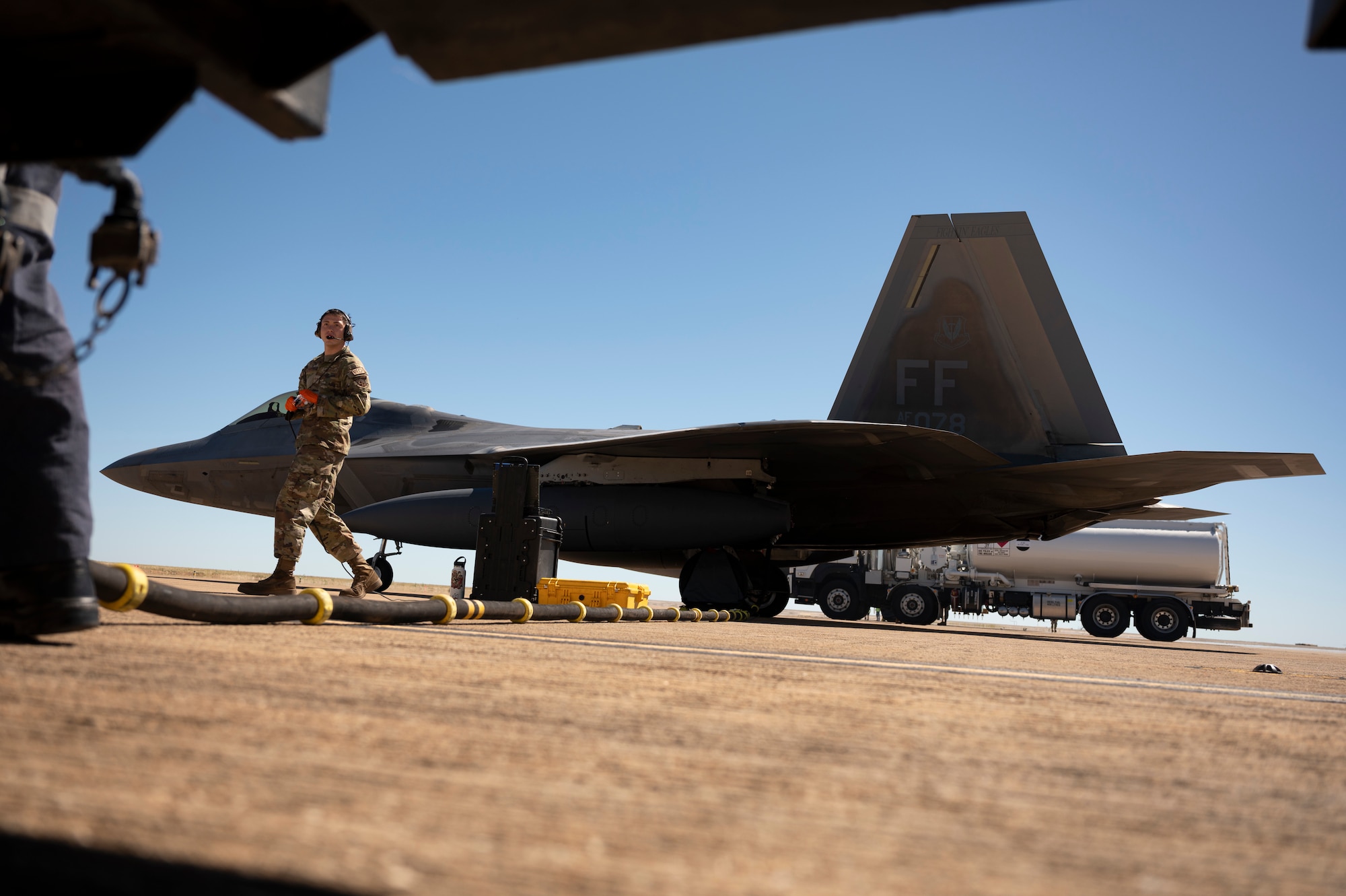 Photo of Royal Australian Air Force and U.S. Air Force personnel talking