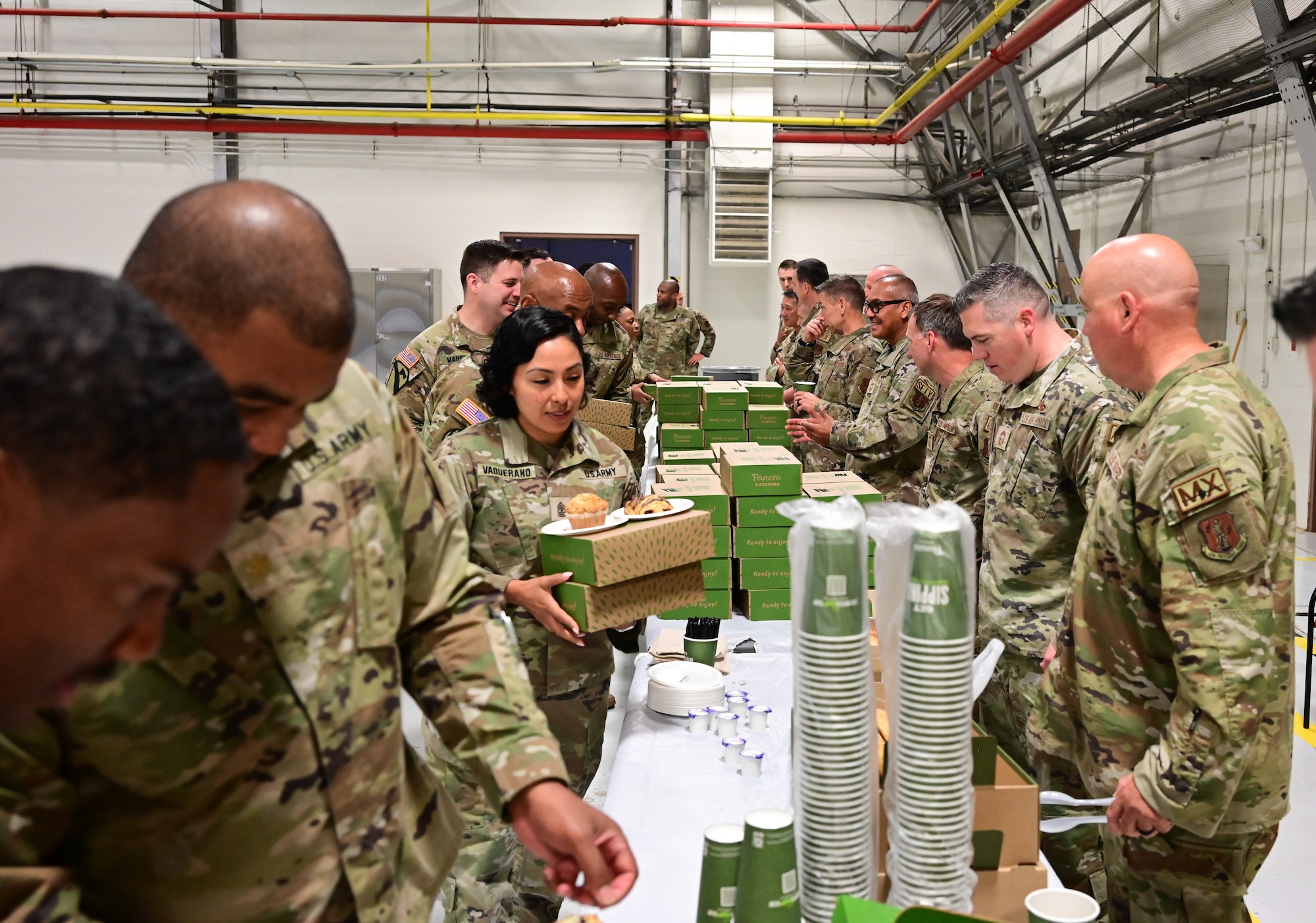 Members of the District of Columbia National Guard pick up breakfast meals during the Annual National Guard Joint Prayer Breakfast held on June 9, 2024, at Joint Base Andrews, Md