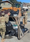 Alaska Army Guardsmen with Joint Task Force – Juneau partner with the Department of Transportation to assist Juneau residents with recovery and cleanup efforts Aug. 8, 2024, following recent flooding after the Mendenhall Glacier’s Suicide Basin released. The State Emergency Operations Center requested 40 members of the Alaska Organized Milita to assist with flood recovery efforts. Seven Guardsmen from Juneau began work Aug. 7, and an additional 33 Air and Army Guard volunteers from the Fairbanks and Anchorage will fly to Juneau in the coming days as part of JTF-J.