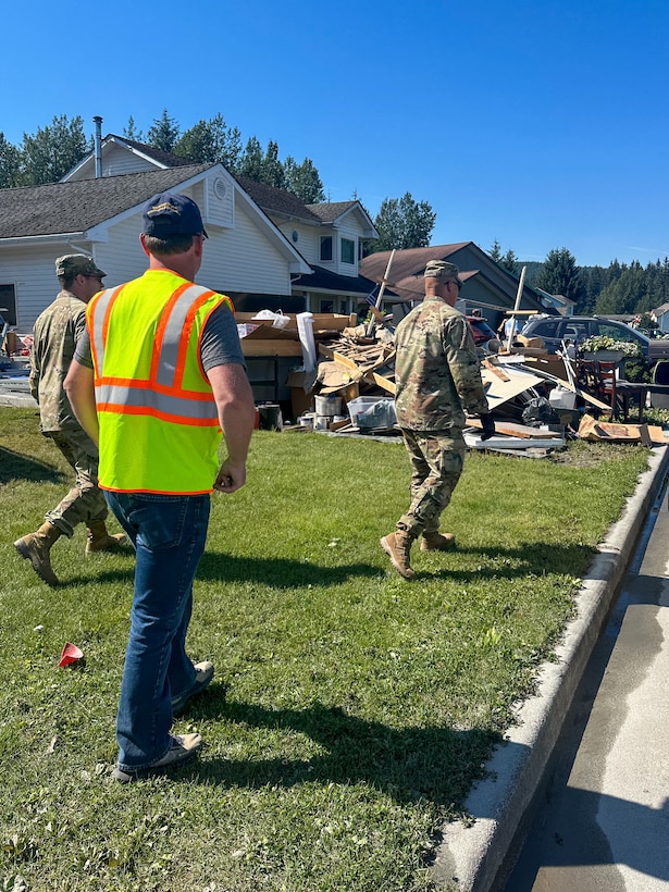 Alaska Army Guardsmen with Joint Task Force – Juneau partner with the Department of Transportation to assist Juneau residents with recovery and cleanup efforts Aug. 8, 2024, following recent flooding after the Mendenhall Glacier’s Suicide Basin released. The State Emergency Operations Center requested 40 members of the Alaska Organized Milita to assist with flood recovery efforts. Seven Guardsmen from Juneau began work Aug. 7, and an additional 33 Air and Army Guard volunteers from the Fairbanks and Anchorage will fly to Juneau in the coming days as part of JTF-J.